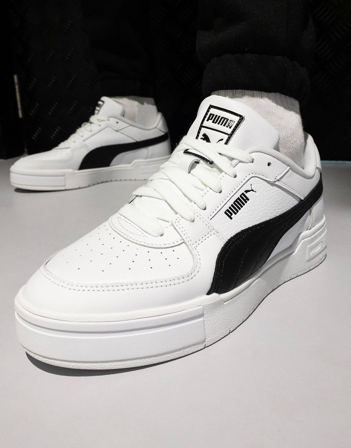 Puma CA Pro sneakers in white and black