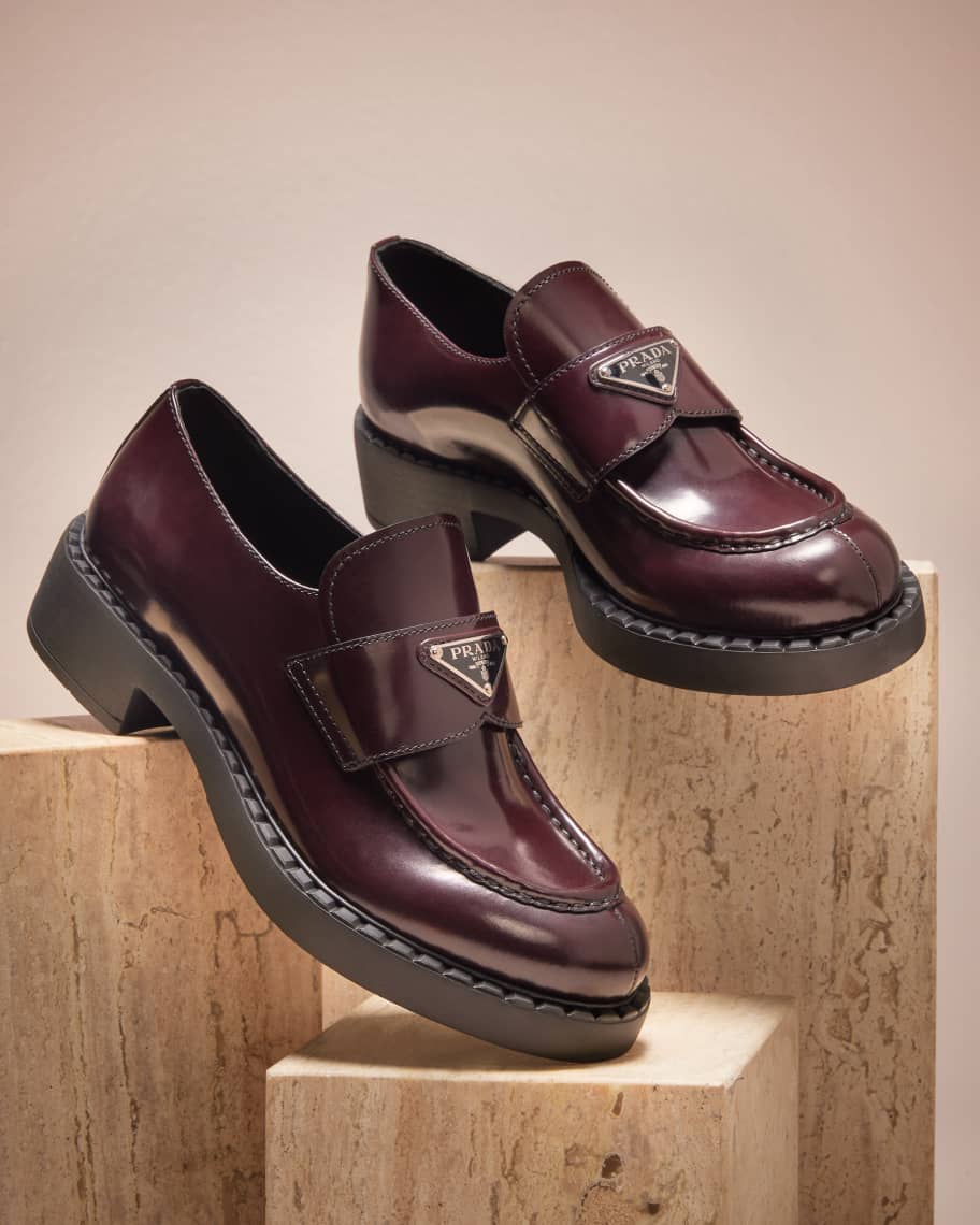 Prada leather loafers with triangle logo