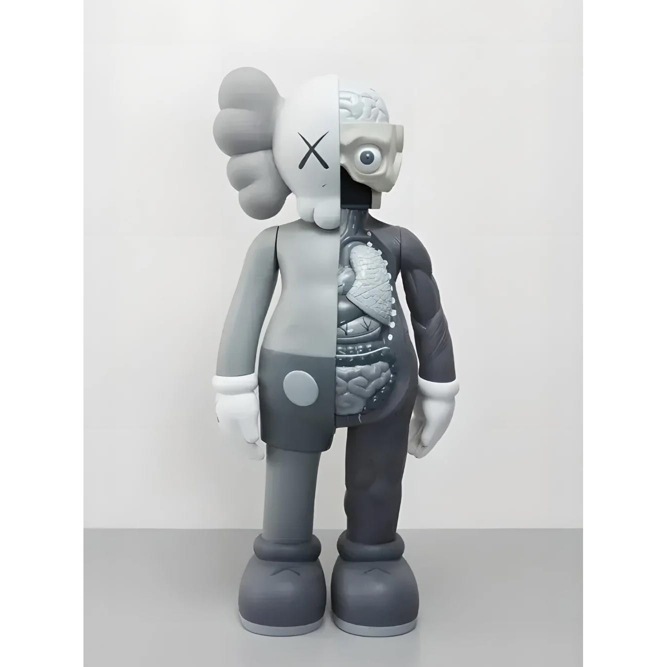 مجسم فينيل من مجموعة Kaws Companion Flayed Open Edition باللون الرمادي