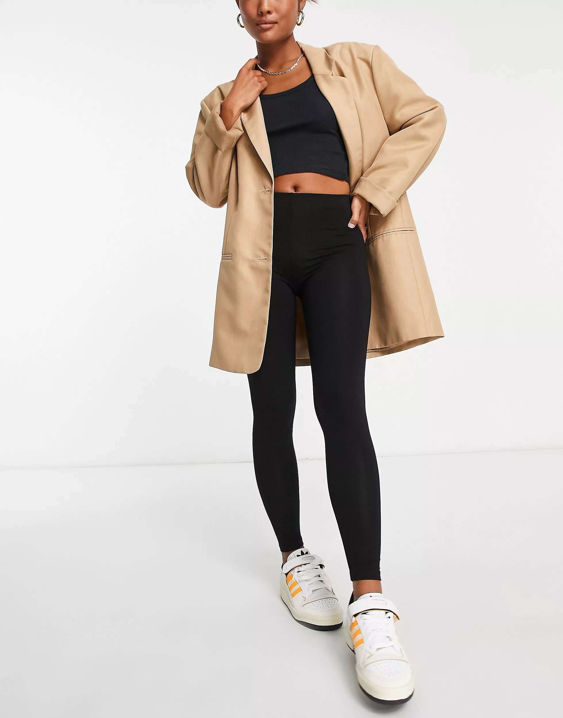 بنطال ضيق Petite من ASOS DESIGN باللون الأسود