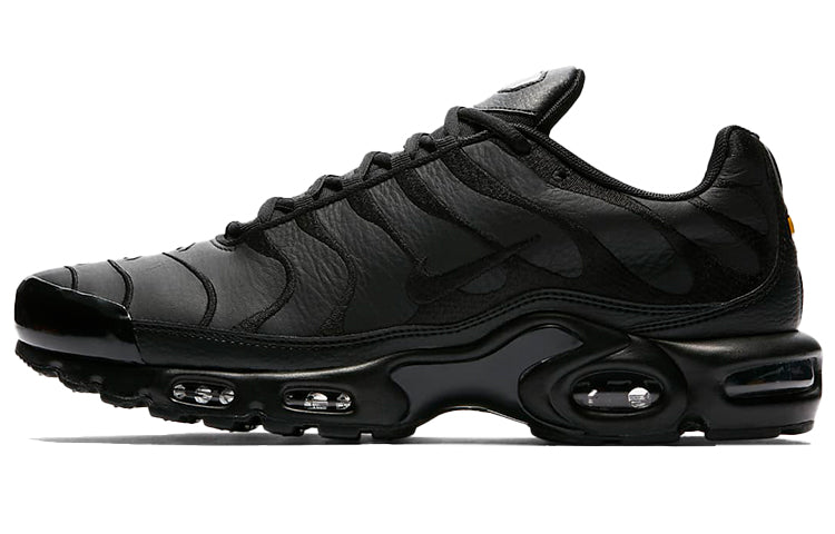 Nike Air Max Plus Triple Black Leather Sneakers