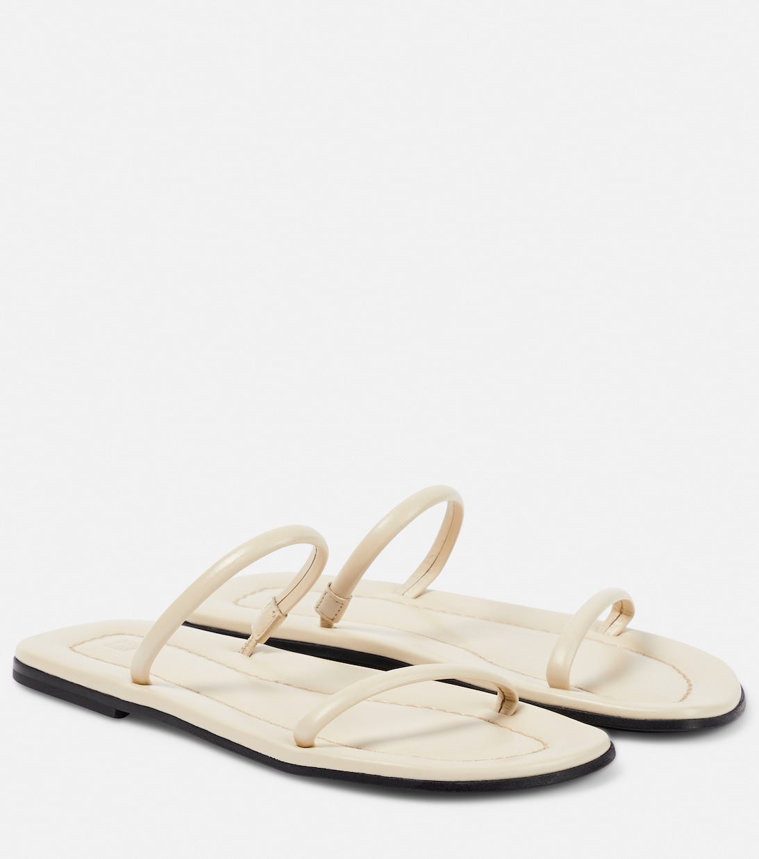 The City Toteme leather slides, beige