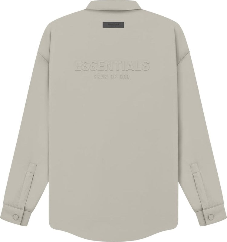 سترة قميص من النايلون المحشوة بشعار Fear of God Essentials "Seal"، باللون الرمادي