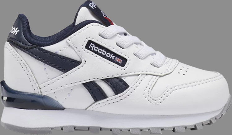 حذاء رياضي كلاسيكي من الجلد من Reebok للأطفال الصغار باللون الأبيض "vector navy"