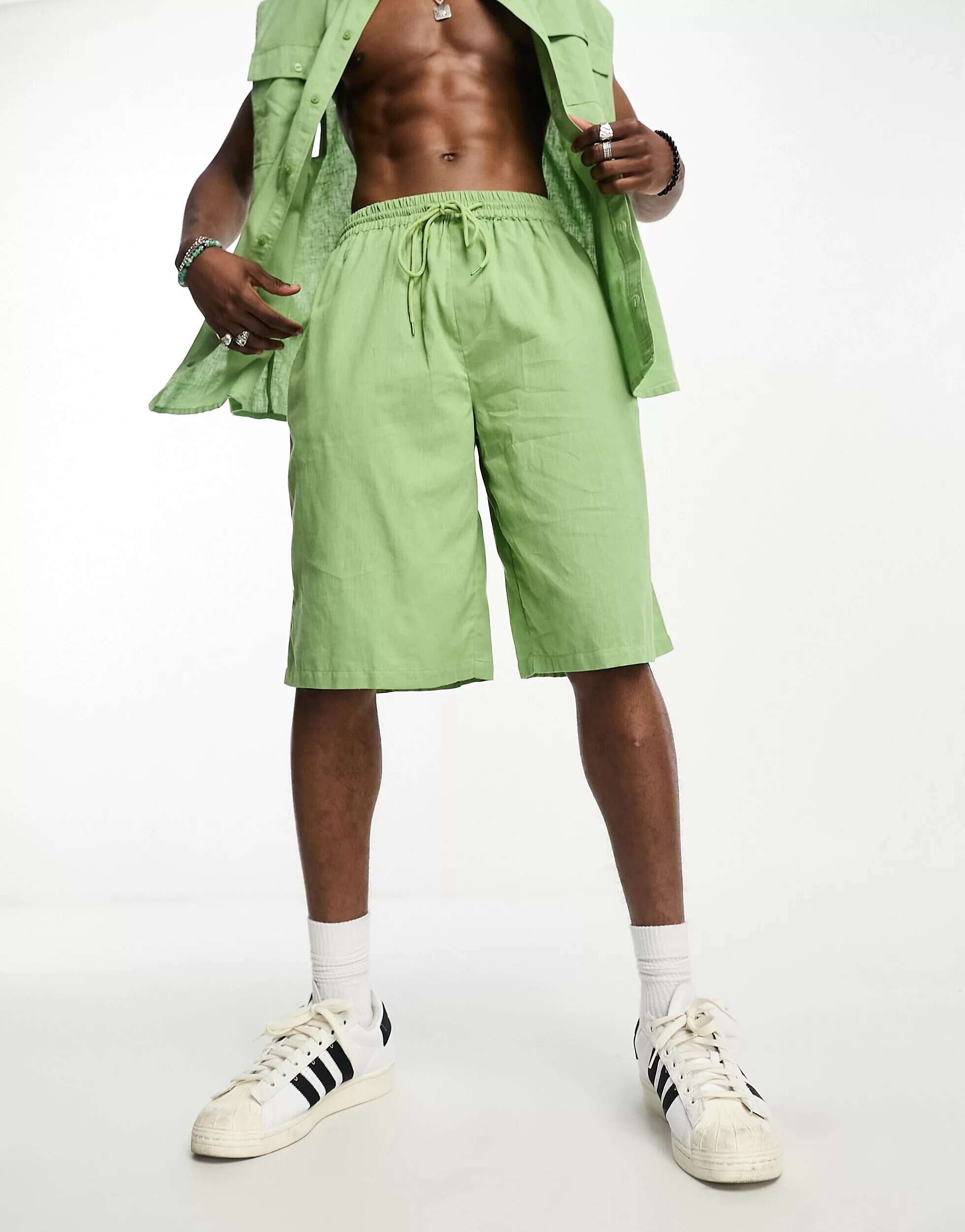 Light green linen COLLUSION beach shorts