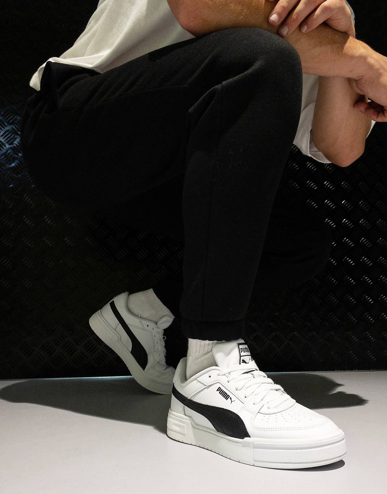 Puma CA Pro sneakers in white and black