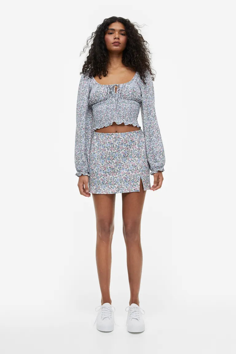 H&M short skirt, cream/floral