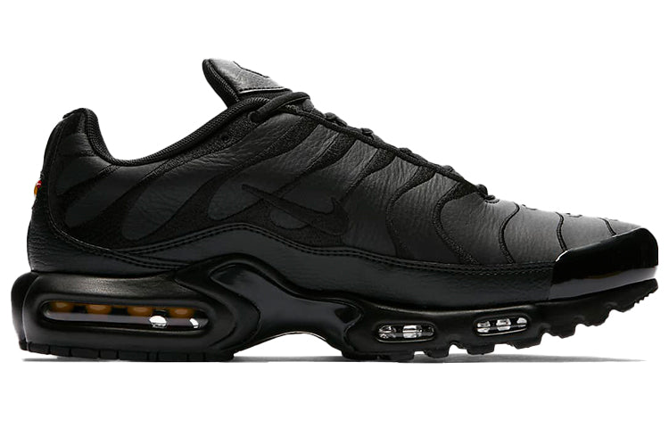 Nike Air Max Plus Triple Black Leather Sneakers