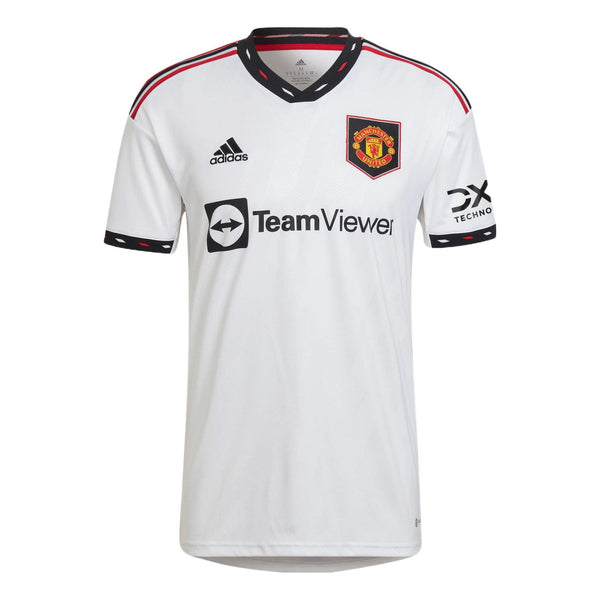 تي شيرت adidas Manchester United Fan Edition Soccer/Football برقبة على شكل حرف V وشعار مخطط وأكمام قصيرة باللون الأبيض